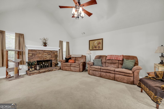 living room featuring plenty of natural light, carpet flooring, a ceiling fan, and high vaulted ceiling