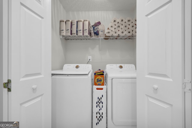 laundry area featuring washer and clothes dryer
