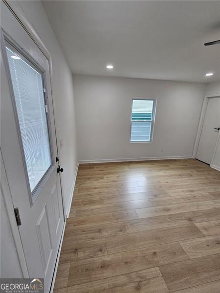 775 Lee Andrews Ave, Atlanta, GA 30315 - empty room featuring light wood-style floors, recessed lighting, and baseboards