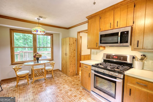 3311 Creek Hollow Dr, Marietta, GA 30062 - kitchen with stainless steel appliances, brick patterned floors, light countertops, ornamental molding, and decorative light fixtures