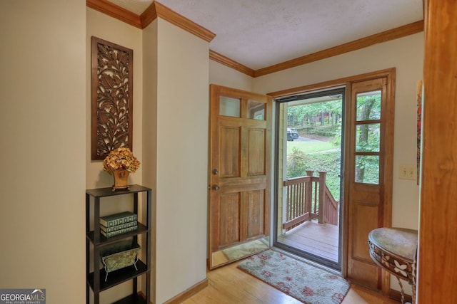 3311 Creek Hollow Dr, Marietta, GA 30062 - foyer with crown molding and light wood-type flooring