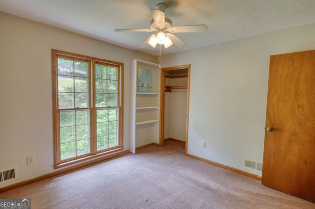 3311 Creek Hollow Dr, Marietta, GA 30062 - unfurnished bedroom featuring carpet flooring, a ceiling fan, and a closet