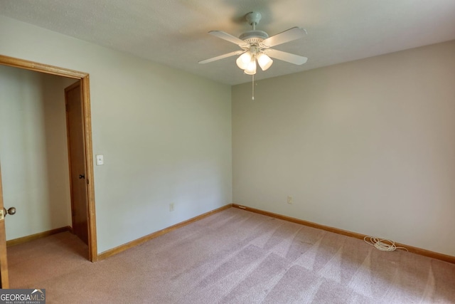 3311 Creek Hollow Dr, Marietta, GA 30062 - spare room with light colored carpet and a ceiling fan