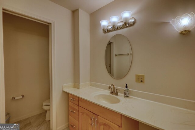3311 Creek Hollow Dr, Marietta, GA 30062 - bathroom featuring toilet and vanity
