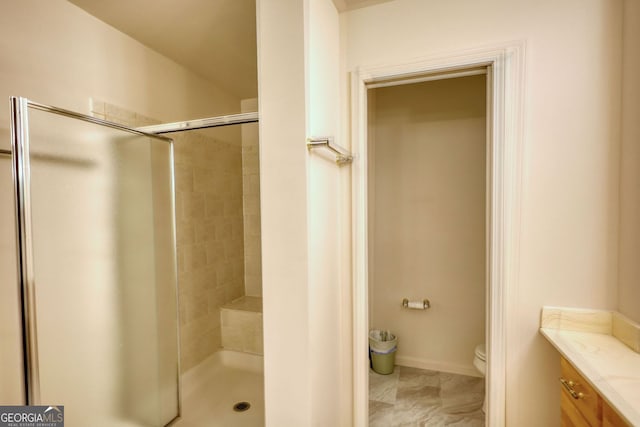 3311 Creek Hollow Dr, Marietta, GA 30062 - bathroom featuring a shower stall, vanity, and marble finish flooring