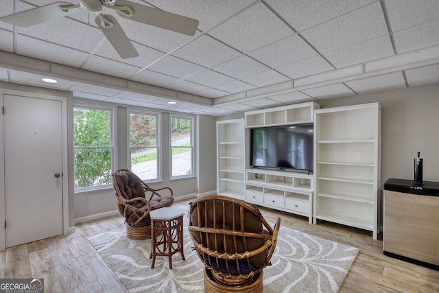 3311 Creek Hollow Dr, Marietta, GA 30062 - sitting room with wood finished floors and a ceiling fan