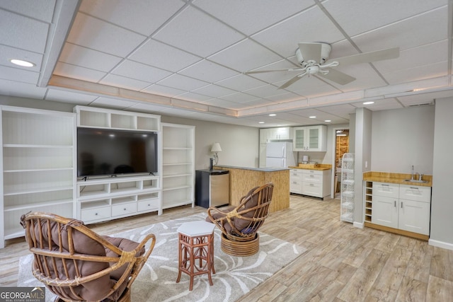 3311 Creek Hollow Dr, Marietta, GA 30062 - living area featuring light wood-type flooring, ceiling fan, recessed lighting, and a paneled ceiling
