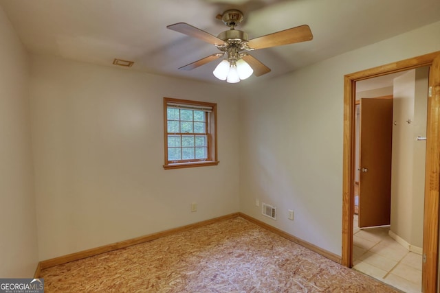 3311 Creek Hollow Dr, Marietta, GA 30062 - spare room with a ceiling fan and baseboards