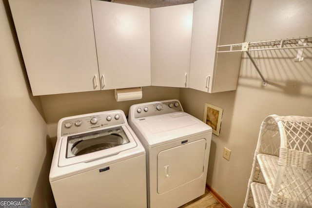 3311 Creek Hollow Dr, Marietta, GA 30062 - laundry room with washing machine and dryer and cabinet space