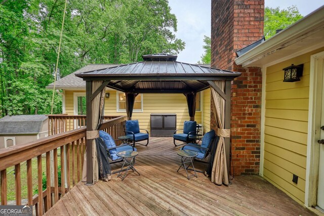 3311 Creek Hollow Dr, Marietta, GA 30062 - wooden deck with a gazebo and an outdoor hangout area