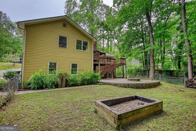 3311 Creek Hollow Dr, Marietta, GA 30062 - back of property with stairs, a fire pit, and a wooden deck
