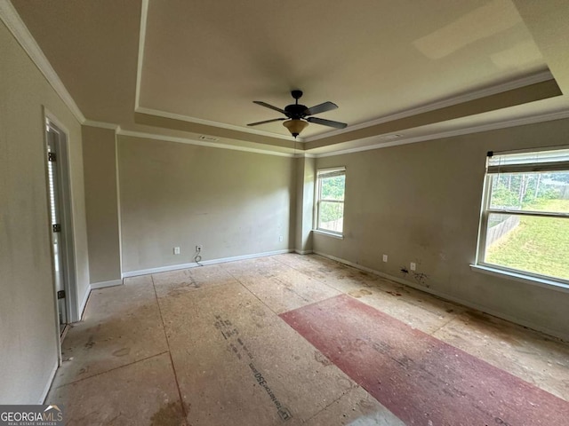79 Parkmont Ln, Dallas, GA 30132 - spare room with a raised ceiling, a ceiling fan, and ornamental molding