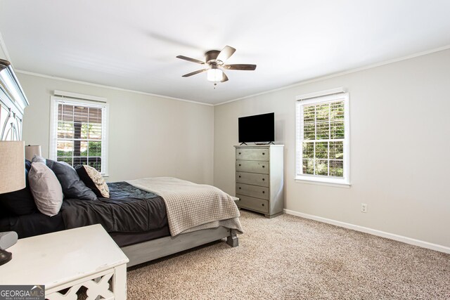 1700 Jimmy Daniel Rd, Watkinsville, GA 30677 - bedroom featuring ornamental molding, baseboards, light carpet, and a ceiling fan