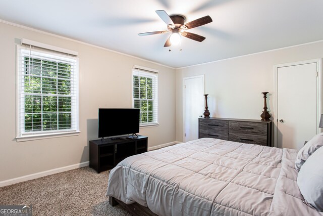 1700 Jimmy Daniel Rd, Watkinsville, GA 30677 - carpeted bedroom with ornamental molding, baseboards, and ceiling fan