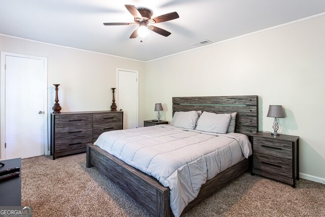 1700 Jimmy Daniel Rd, Watkinsville, GA 30677 - carpeted bedroom featuring ornamental molding, a ceiling fan, and baseboards