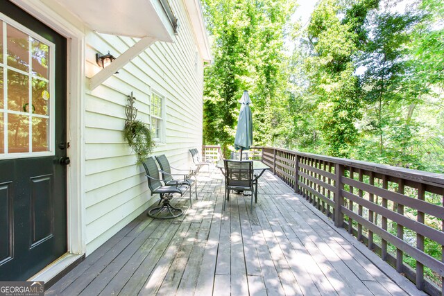 1700 Jimmy Daniel Rd, Watkinsville, GA 30677 - wooden terrace with outdoor dining area