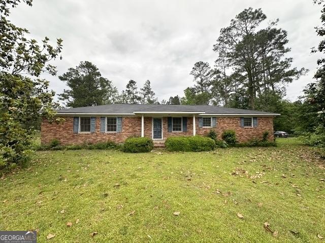 310 Advantage Ln, Swainsboro, GA 30401 - single story home with a front yard and brick siding