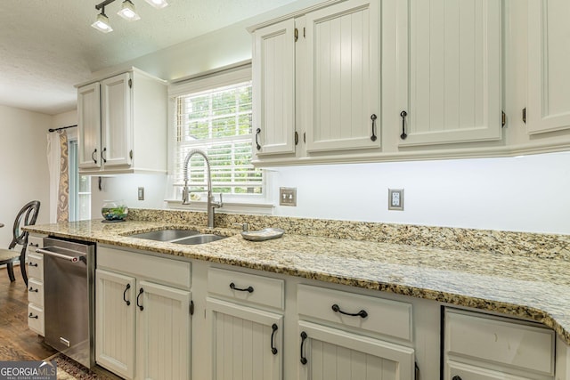 4314 Arbor Bridge Ct, Marietta, GA 30066 - kitchen with dishwasher, a textured ceiling, dark wood-style flooring, light stone counters, and white cabinets