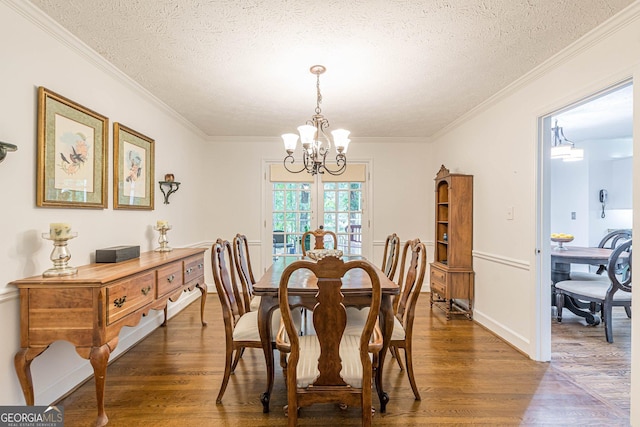 4314 Arbor Bridge Ct, Marietta, GA 30066 - dining space featuring a chandelier, wood finished floors, ornamental molding, a textured ceiling, and french doors