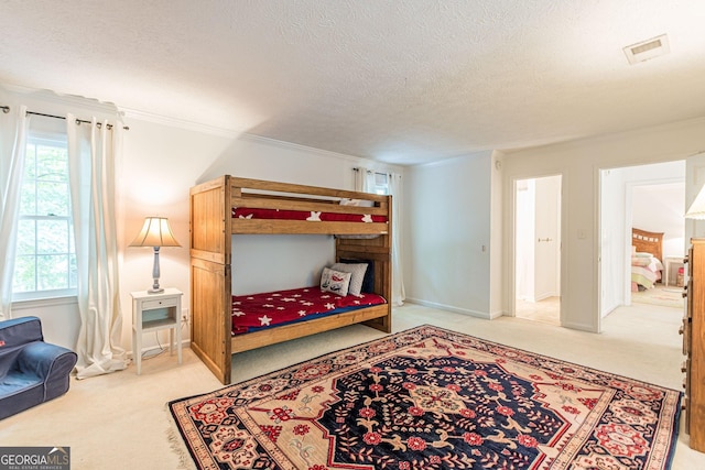 4314 Arbor Bridge Ct, Marietta, GA 30066 - bedroom with light carpet, a textured ceiling, and ornamental molding