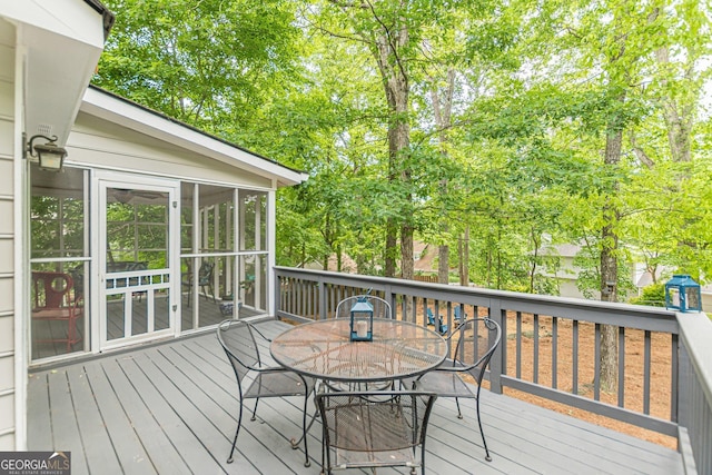 4314 Arbor Bridge Ct, Marietta, GA 30066 - wooden deck featuring outdoor dining area and a sunroom