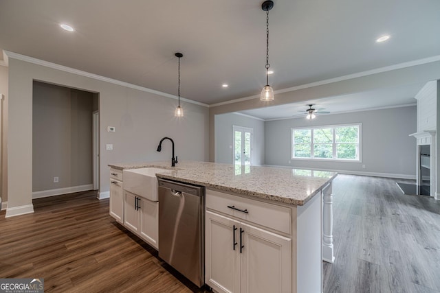 1482 Alcovy Station Rd, Covington, GA 30014 - kitchen featuring stainless steel dishwasher, a sink, a ceiling fan, dark wood-type flooring, and ornamental molding