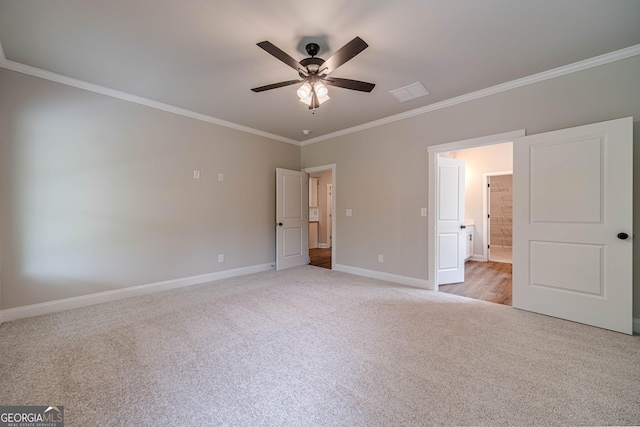 1482 Alcovy Station Rd, Covington, GA 30014 - unfurnished bedroom featuring crown molding, light colored carpet, baseboards, and a ceiling fan