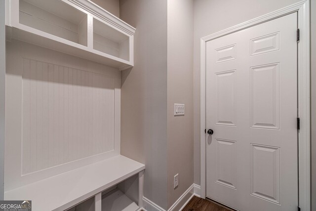 1482 Alcovy Station Rd, Covington, GA 30014 - mudroom featuring baseboards and dark wood-style flooring