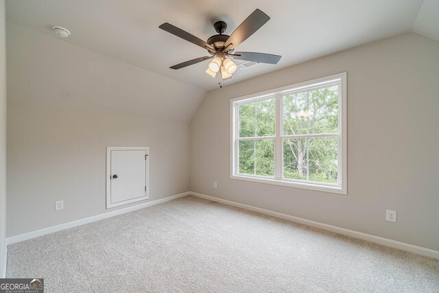 1482 Alcovy Station Rd, Covington, GA 30014 - bonus room featuring lofted ceiling, carpet floors, baseboards, and a ceiling fan