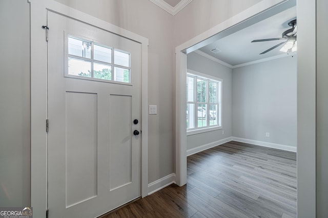 1482 Alcovy Station Rd, Covington, GA 30014 - entryway featuring crown molding, wood finished floors, baseboards, and a ceiling fan