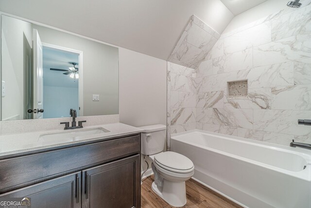 1482 Alcovy Station Rd, Covington, GA 30014 - bathroom featuring toilet, wood finished floors, vanity, shower / bath combination, and a ceiling fan