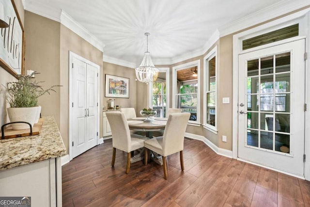 3232 Cates Ave NE, Brookhaven, GA 30319 - dining room with a chandelier, dark wood-type flooring, and ornamental molding