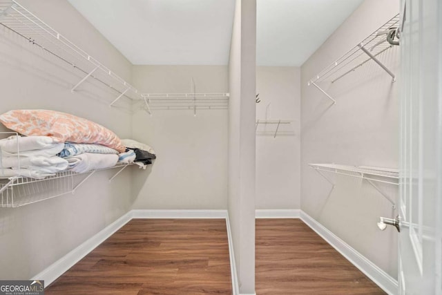 3232 Cates Ave NE, Brookhaven, GA 30319 - walk in closet with wood finished floors