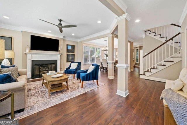 3232 Cates Ave NE, Brookhaven, GA 30319 - living area featuring a ceiling fan, a fireplace with raised hearth, ornamental molding, stairs, and recessed lighting