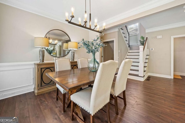 3232 Cates Ave NE, Brookhaven, GA 30319 - dining space featuring hardwood / wood-style floors, ornamental molding, stairs, and a chandelier