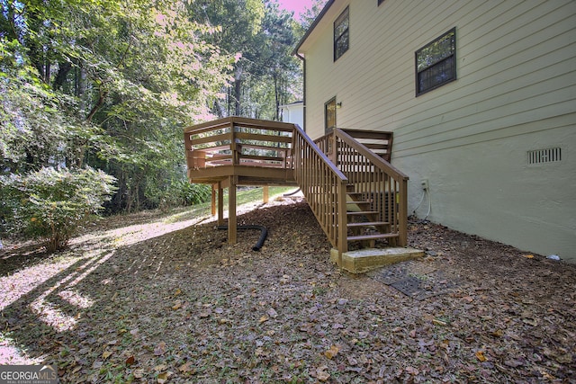 wooden terrace featuring stairway