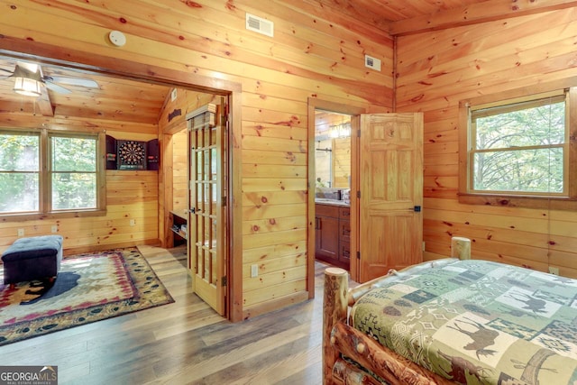 162 Little Falls Dr, Mineral Bluff, GA 30559 - bedroom featuring wood walls, wooden ceiling, and light wood-style flooring
