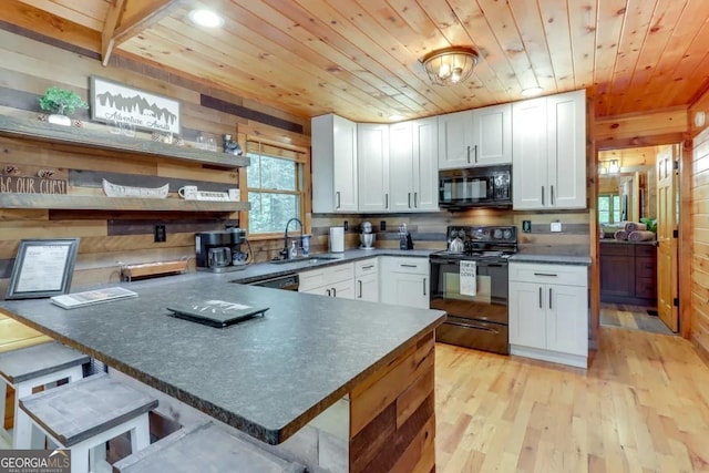 162 Little Falls Dr, Mineral Bluff, GA 30559 - kitchen with black appliances, a sink, open shelves, wooden ceiling, and a peninsula