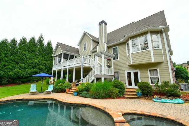3740 Duckcove Way, Cumming, GA 30041 - rear view of property with french doors, stairway, a chimney, and an outdoor pool