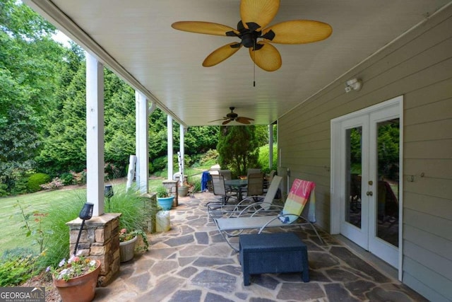 view of patio / terrace with french doors, outdoor dining area, and a ceiling fan