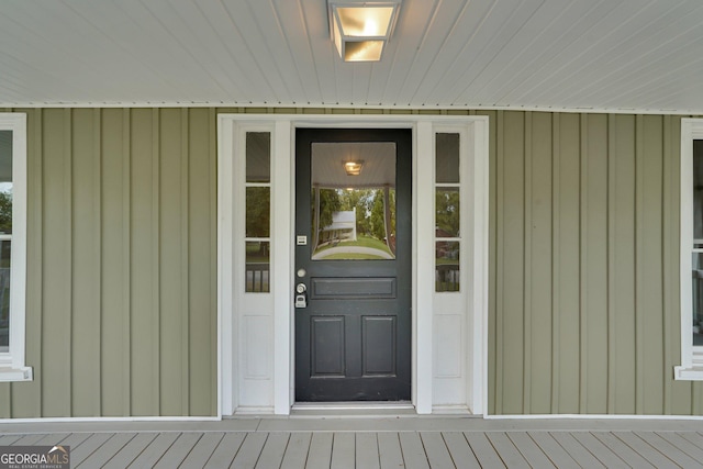 245 N Terrell St, Metter, GA 30439 - property entrance featuring board and batten siding