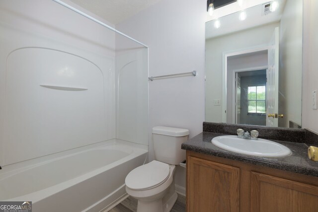 301 Silver Spring St, Dallas, GA 30157 - bathroom featuring toilet, vanity, and shower / washtub combination