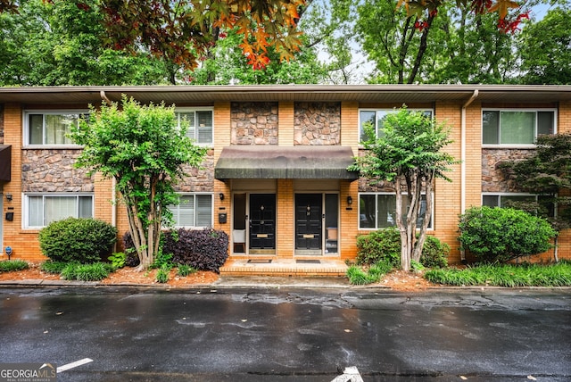 120 Biscayne Dr NW Unit C13, Atlanta, GA 30309 - view of front of house with brick siding and stone siding