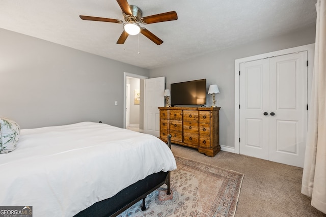 120 Biscayne Dr NW Unit C13, Atlanta, GA 30309 - bedroom featuring carpet floors, ceiling fan, and a closet