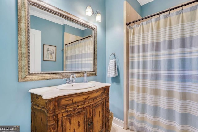 full bath featuring vanity and a shower with shower curtain