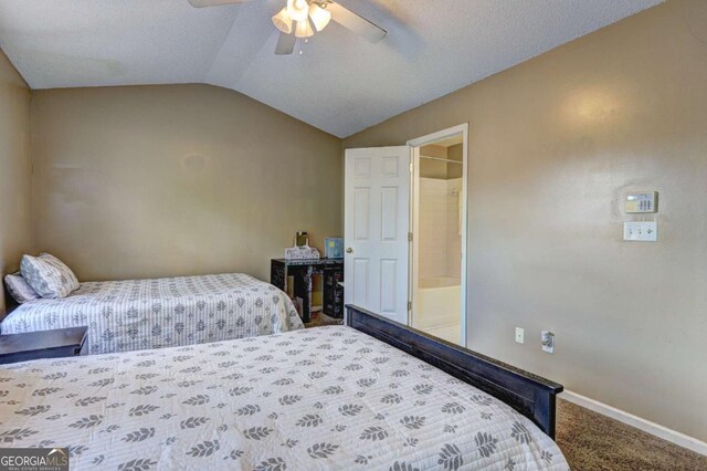 10900 Wittenridge Dr Unit L6, Alpharetta, GA 30022 - bedroom featuring carpet floors, vaulted ceiling, baseboards, ensuite bath, and ceiling fan