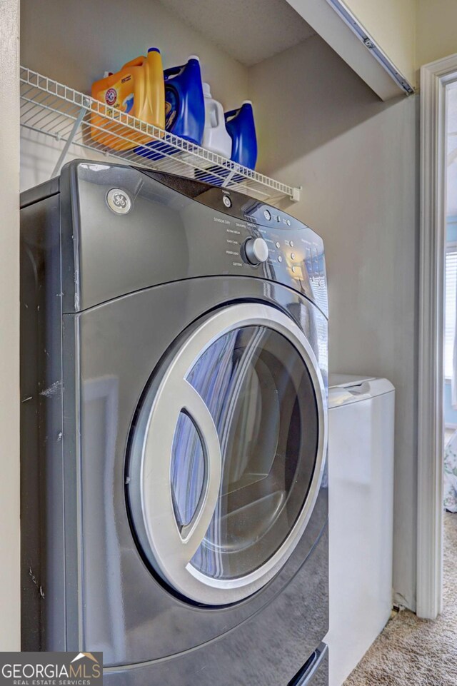10900 Wittenridge Dr Unit L6, Alpharetta, GA 30022 - laundry area with independent washer and dryer and carpet flooring