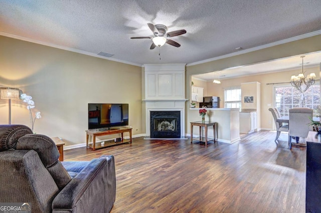 10900 Wittenridge Dr Unit L6, Alpharetta, GA 30022 - living area with a chandelier, a ceiling fan, dark wood finished floors, ornamental molding, and a textured ceiling