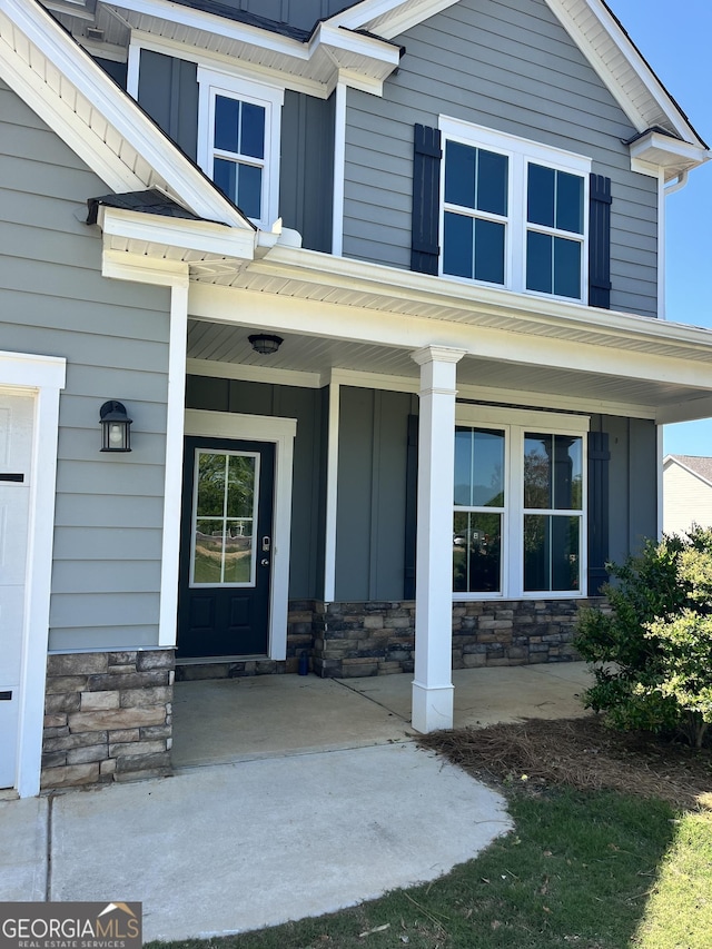 131 Queens Cemetery Rd, Good Hope, GA 30641 - entrance to property featuring board and batten siding and a porch