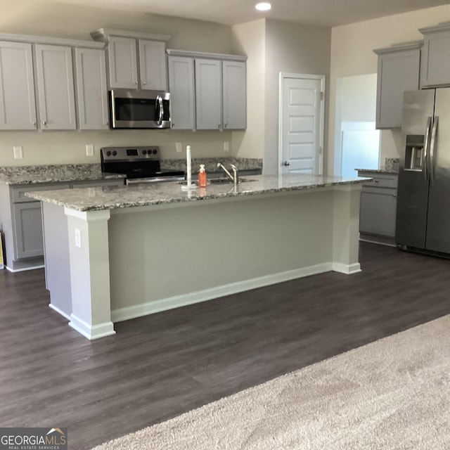 131 Queens Cemetery Rd, Good Hope, GA 30641 - kitchen with stainless steel appliances, gray cabinetry, dark wood-type flooring, and recessed lighting